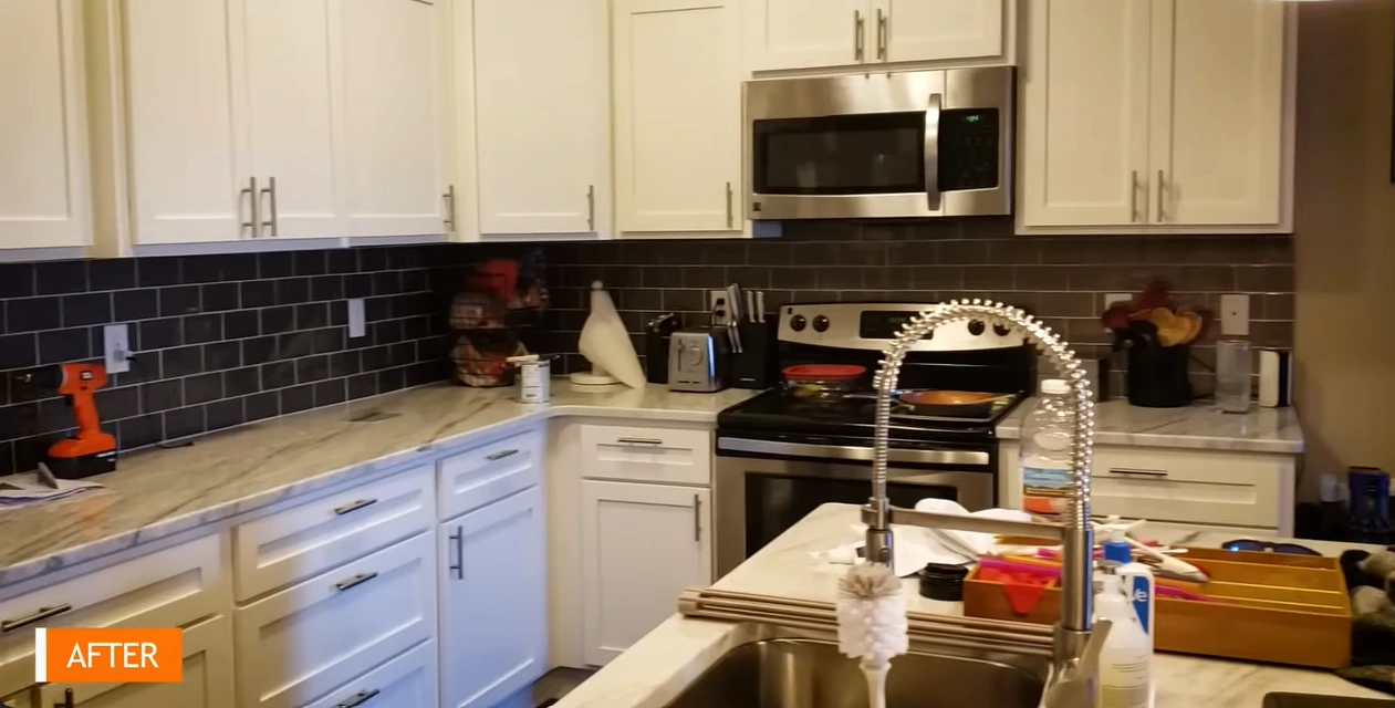 Remodeled kitchen with white cabinets