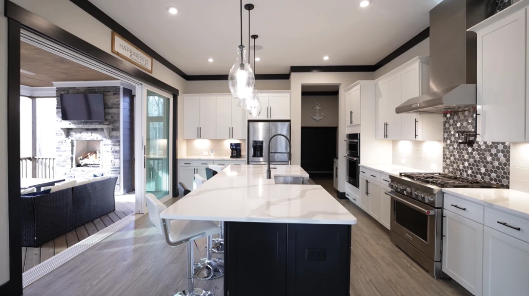 Updated kitchen design with custom cabinetry and spacious island
